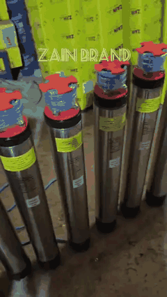 Looping clip panning across a row of finished Zain stainless steel submersible pumps on the workshop floor