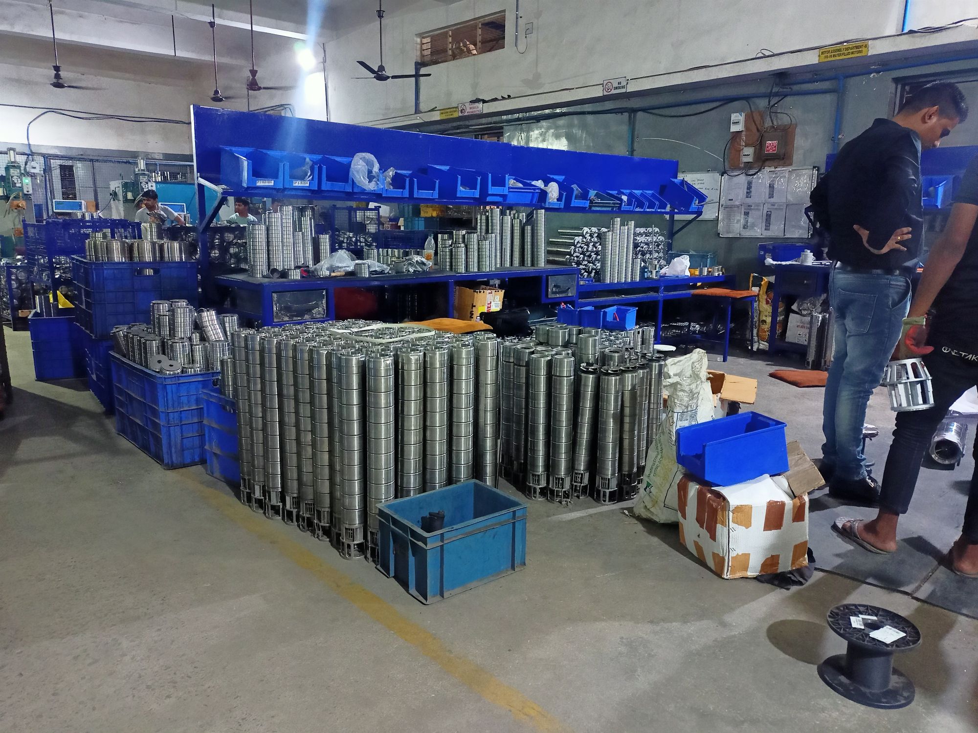 Stainless steel pump components and assemblies on the workshop floor