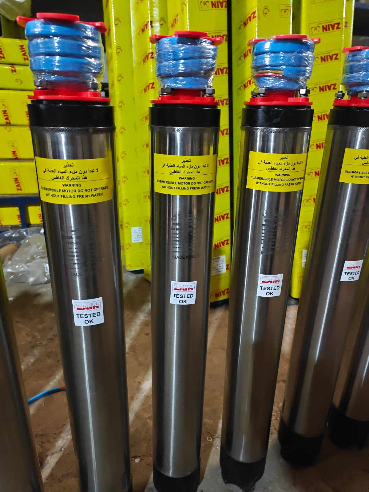 Row of polished stainless steel Zain submersible motors ready for dispatch